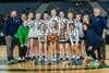 The Woodinville Lady Falcons hold the fourth-place trophy. Photos by Collen Colley.